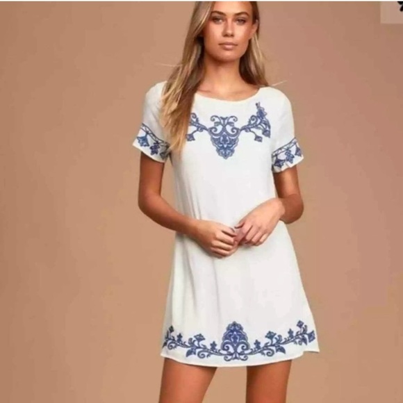 Lulus Dresses & Skirts - Lulu's tell a tale dress white with blue embroidery